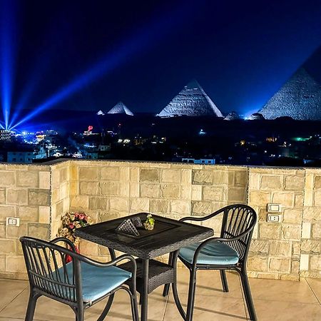 Jumeirah Pyramids View Inn Kafret el-Gabal Exterior foto