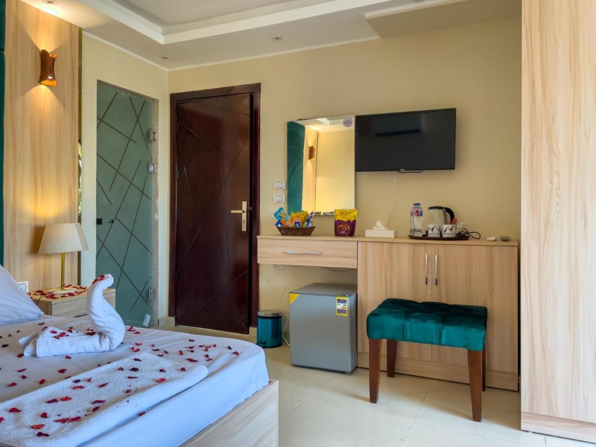 Jumeirah Pyramids View Inn Kafret el-Gabal Exterior foto
