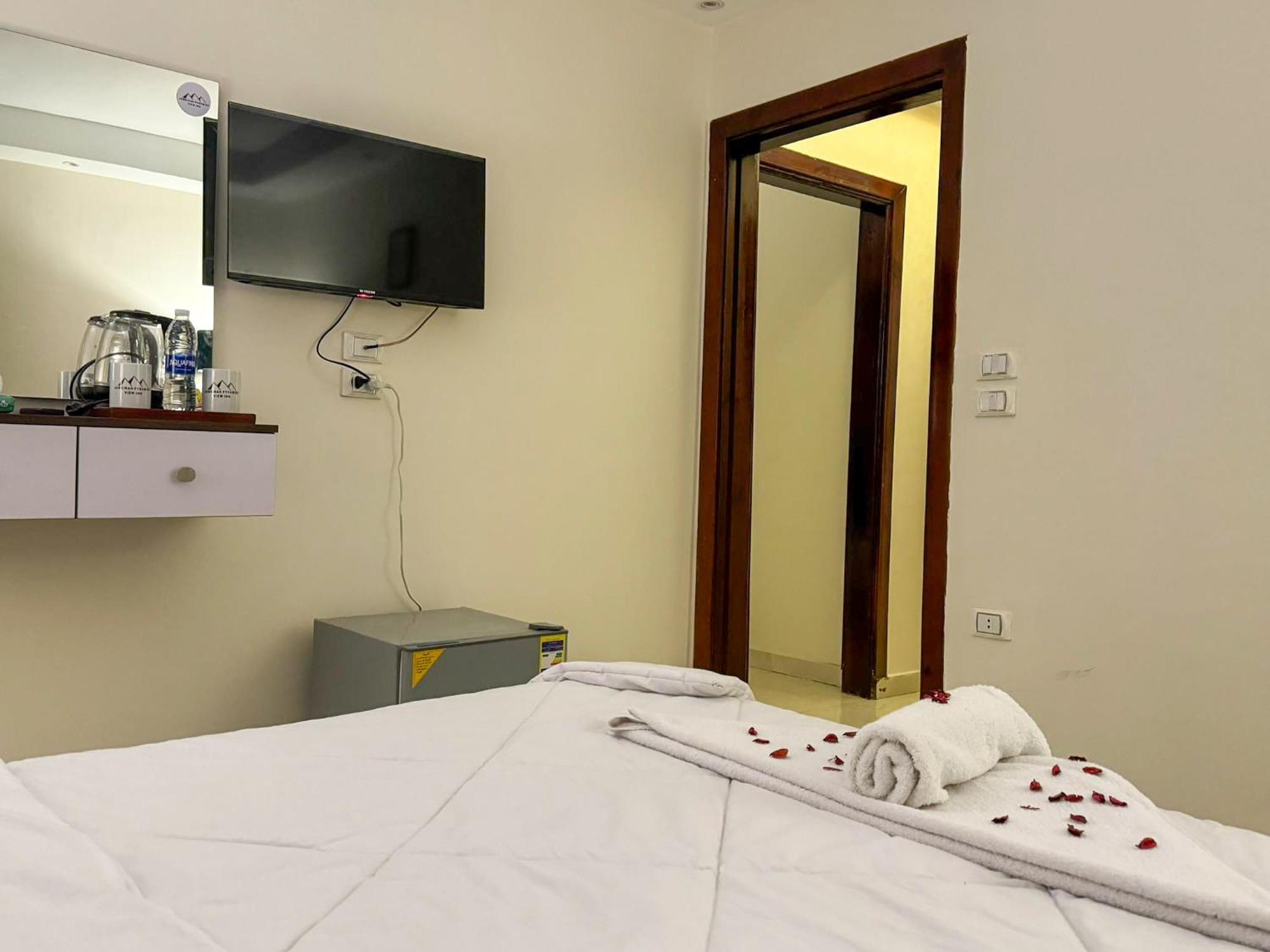 Jumeirah Pyramids View Inn Kafret el-Gabal Zimmer foto